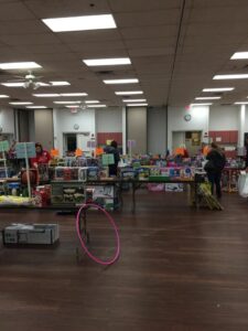 Toys laid out on multiple tables