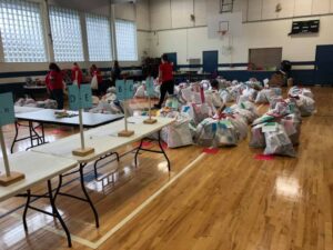 Gifts bagged up and ready for pickup in Gym